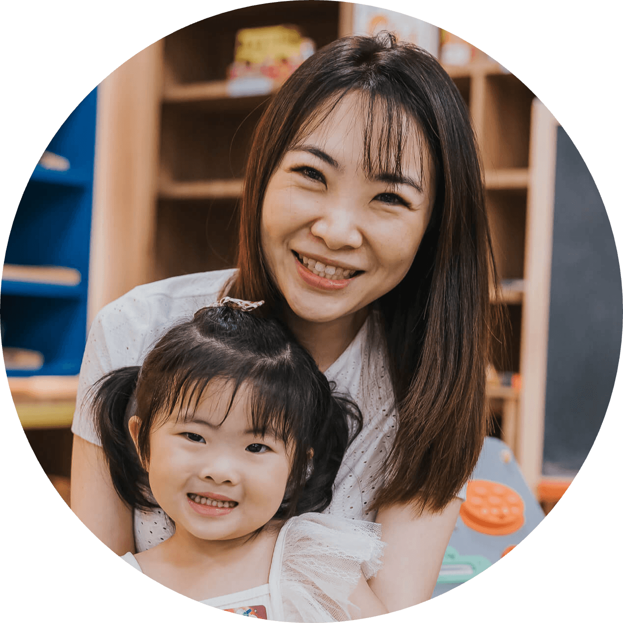 singaporean mother hugging her daughter for kids birthday photography celebration