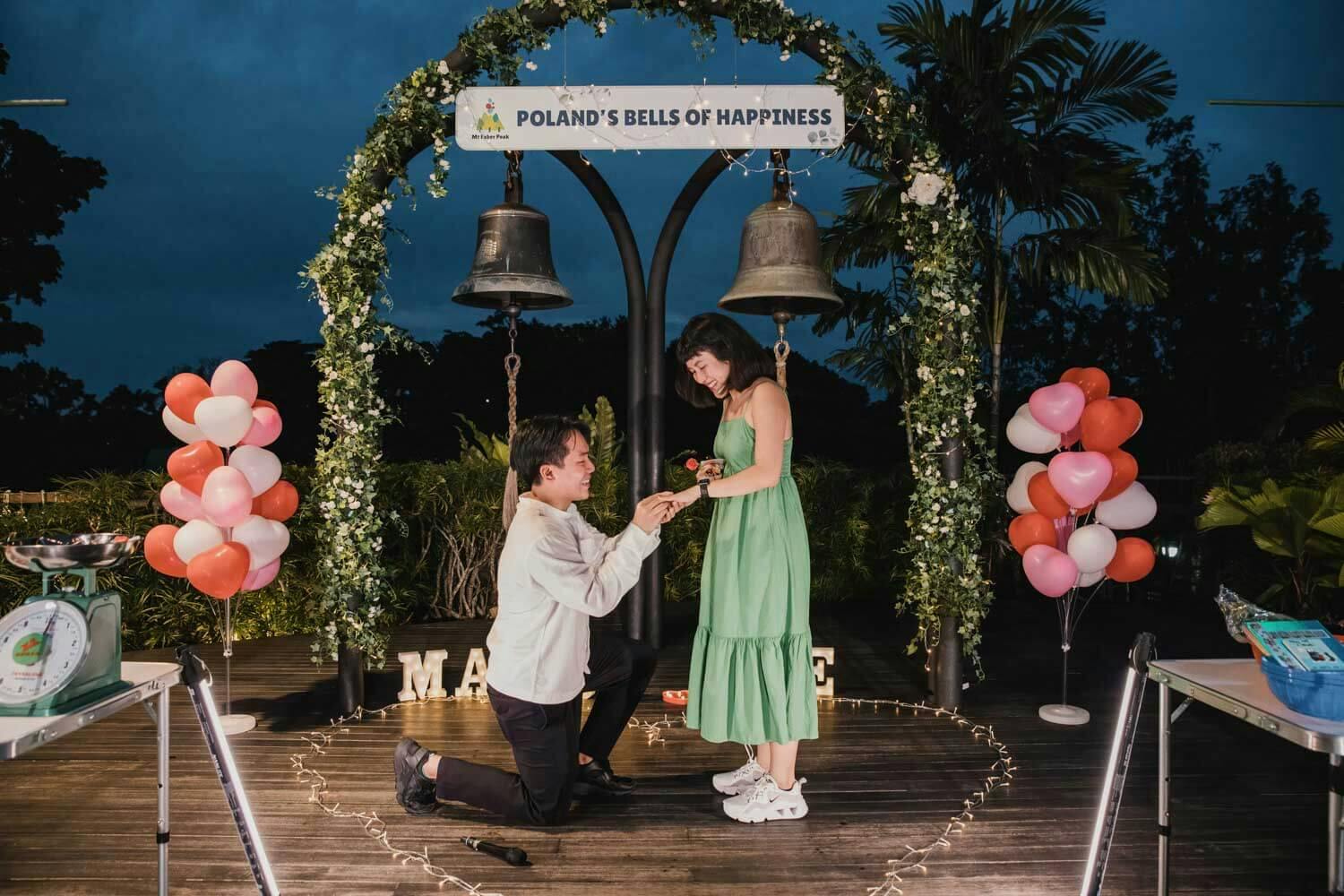 surprise proposal in singapore mount faber with song and dance