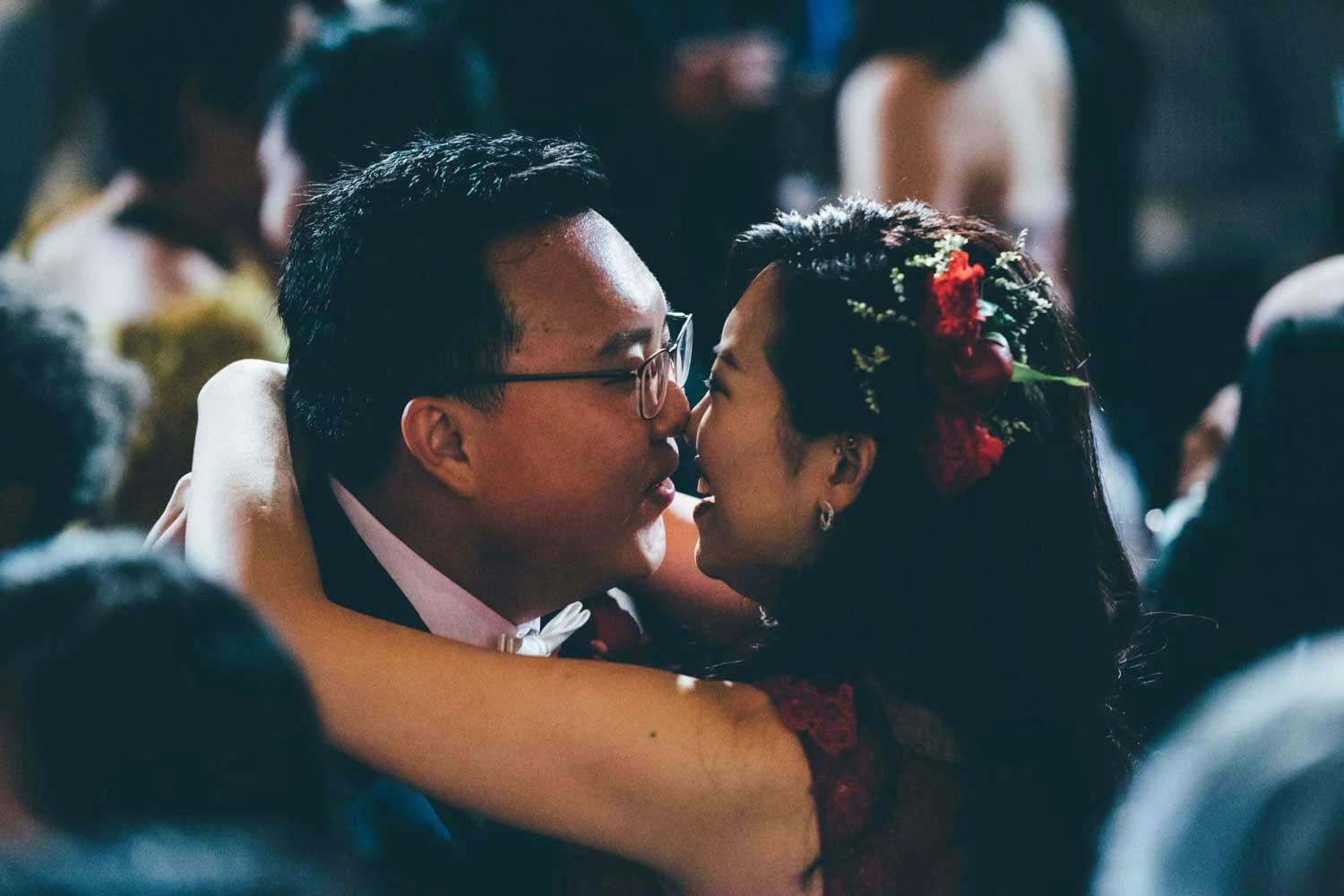 bride-and-groom-dancing-together-best-wedding-photographer-in-singapore-actual-day