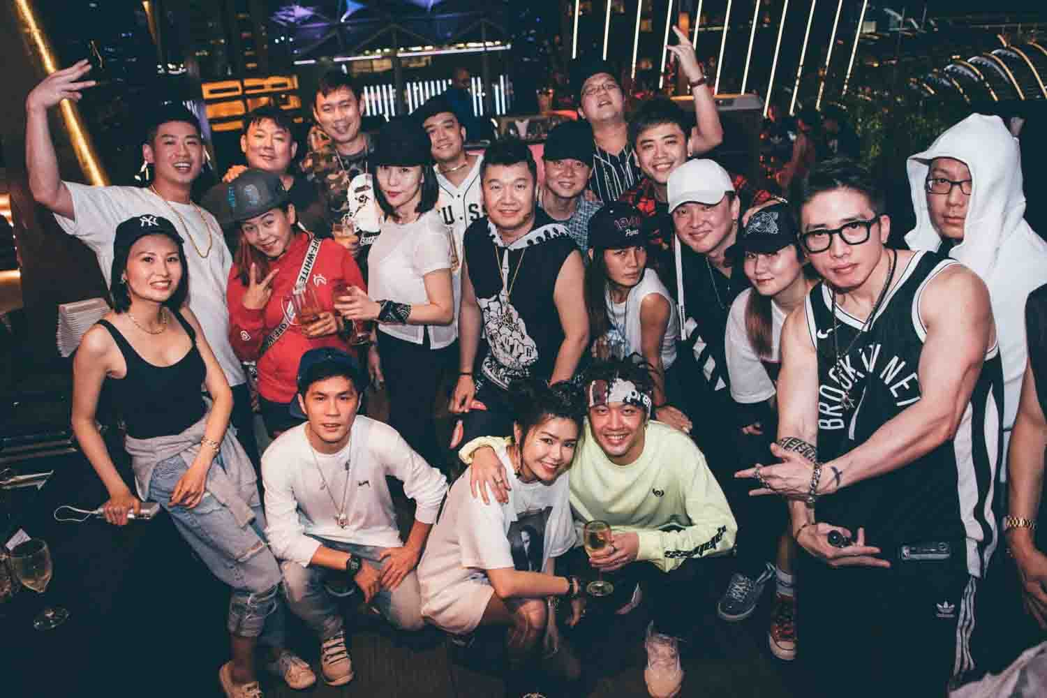 rooftop engagement party at naumi hotel rooftop bar nightlife photographer in singapore