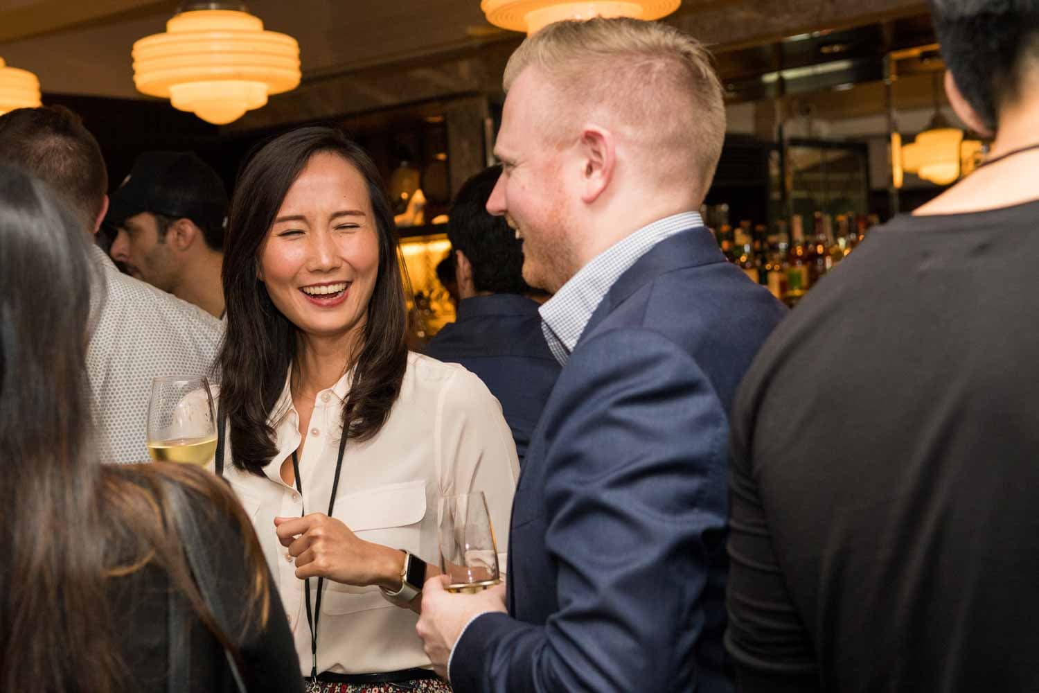 lady laughing at rakuten singapore marketing launch event at black swan bar event