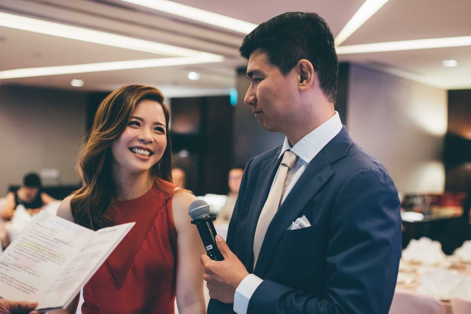 bride looking and smiling at groom during actual wedding day photography singapore